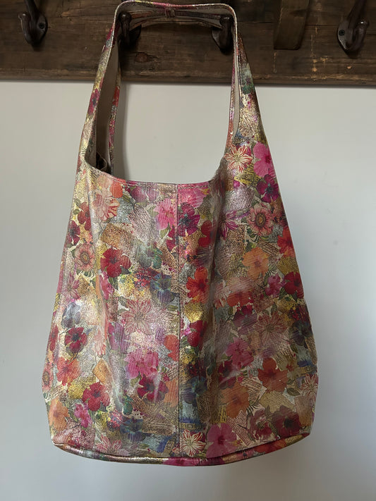 Leren bewerkte bloemen tas